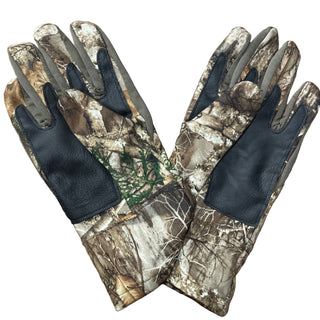 Pair of camouflage gloves on a wooden surface