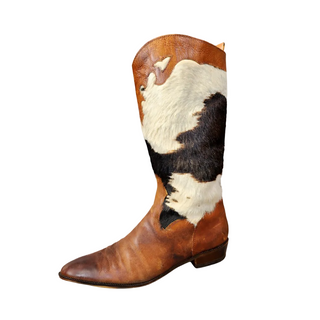 Brown cowboy boot with cowhide pattern on a white background