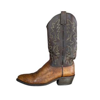 Brown leather boot with intricate design at Four Elks