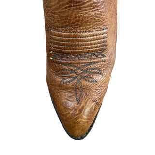 Brown leather boot with intricate stitching at Four Elks