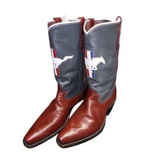 Pair of cowboy boots with a horse design on a white background.