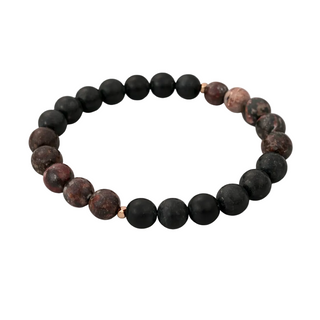 Black and brown beaded bracelet on a white background