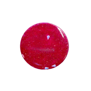 Pair of pink round earrings on a white background