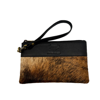 Black and brown fur pouch with a strap on a white background