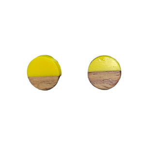 Round earrings with yellow top and wooden bottom on a white background