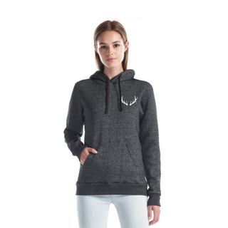 Woman wearing a dark gray hoodie with a white antler design on a white background