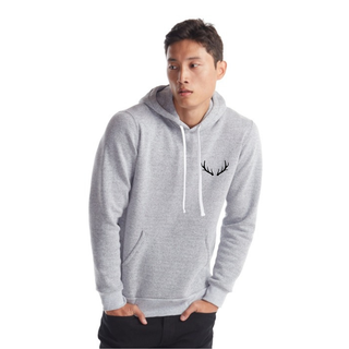 Person wearing a gray hoodie with a black antler design on a white background