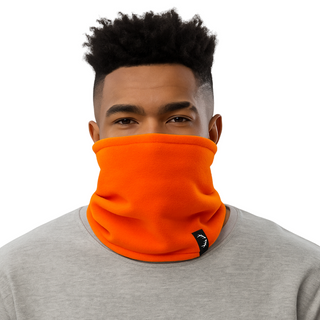 Person wearing an orange neck gaiter with a gray shirt on a white background
