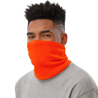Man wearing an orange neck gaiter on a white background
