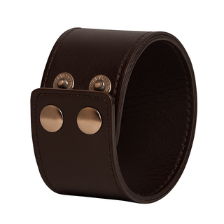 Brown leather cuff with gold circular accents on a white background