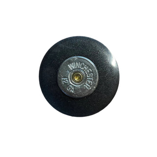 Black phone  pop with a metallic bullet on a white background