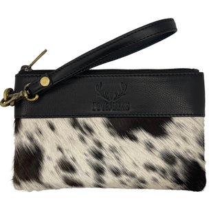 A cowhide clutch with black leather trimmings and a wristband, featuring a zipper closure, with the Four Elks logo embossed on the front.