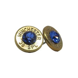 Gold Winchester 38 SPL bullet-shaped earrings with blue gemstones on a white background