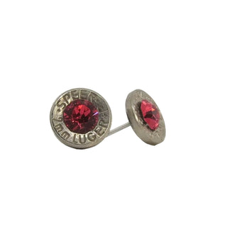 A pair of red stud earrings made from recycled bullet casing with a ruby gemstone, presented on a white background.